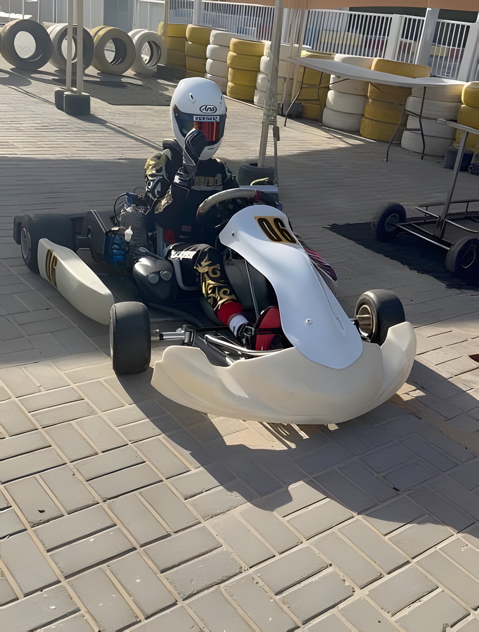 Kart 06 parked and race ready, tyre wall behind