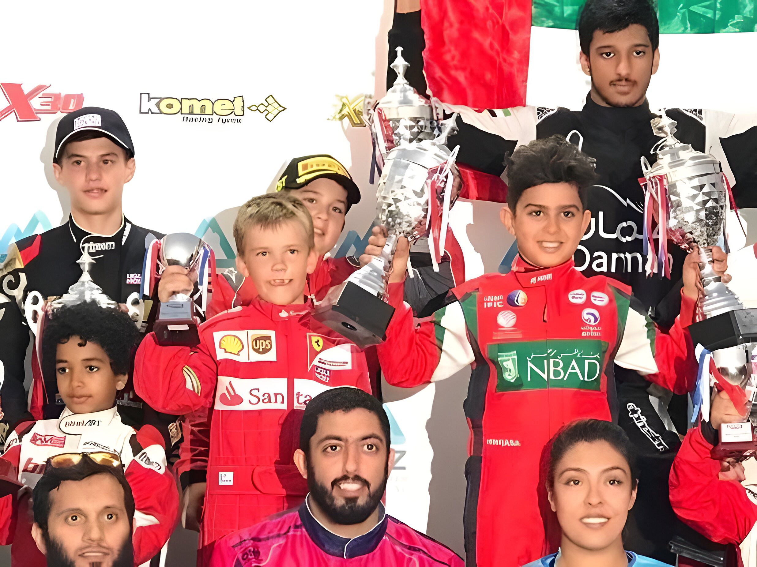 Champions' row: trophies up and flags flying after the final round