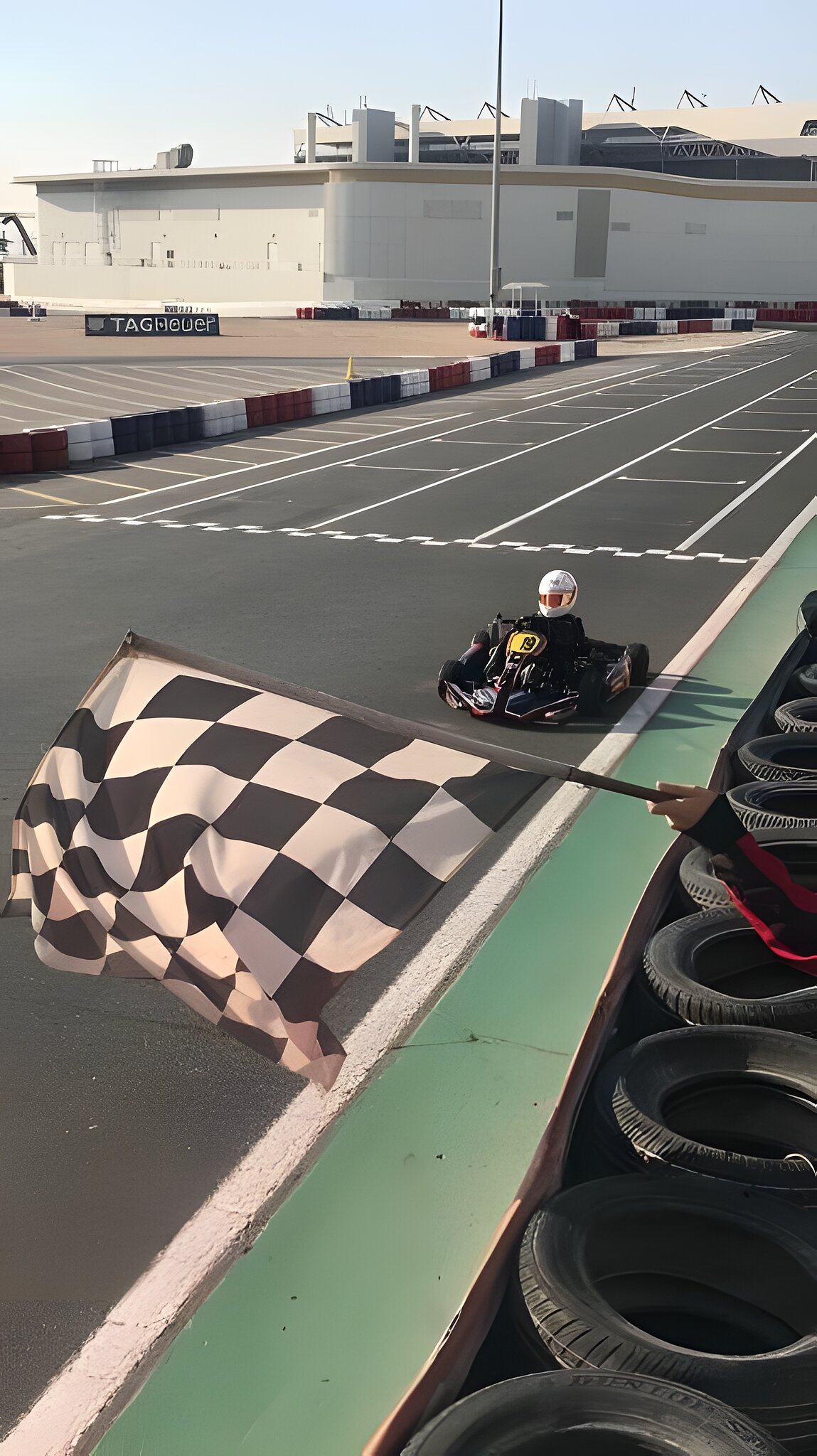 Taking the chequered flag at Dubai Kartdrome