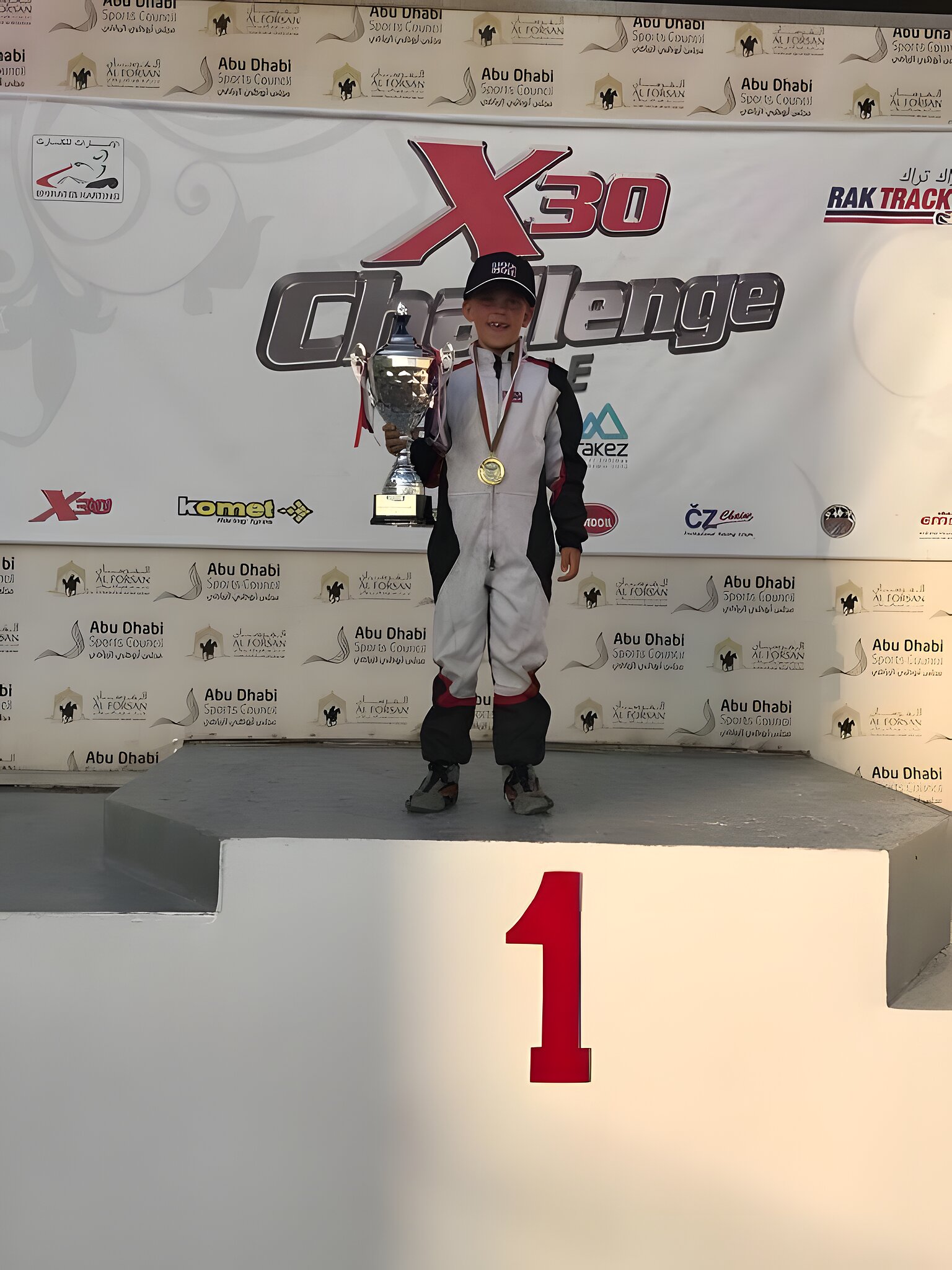 Top step, X30 Challenge UAE, trophy up