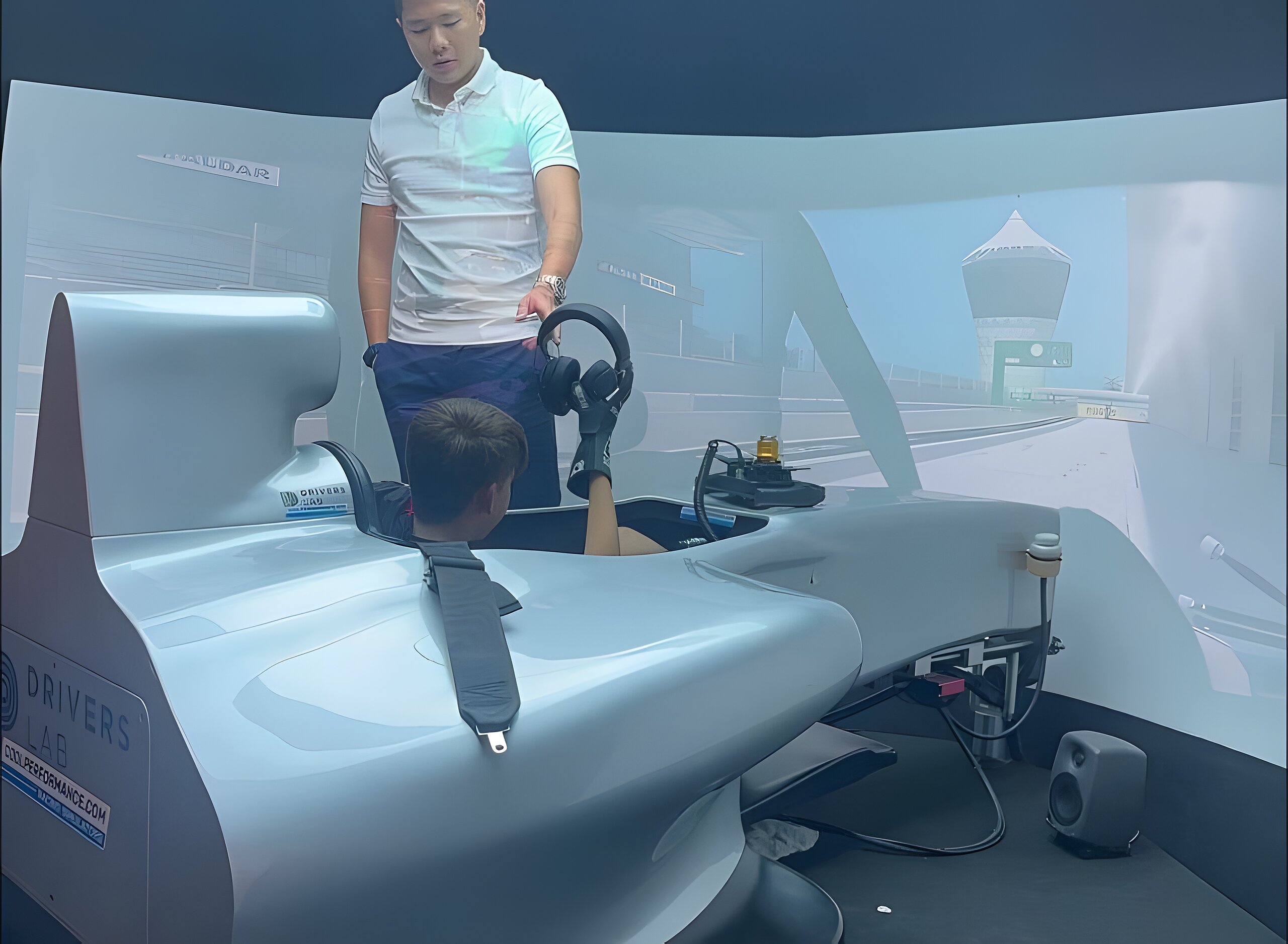 Zac strapped into a full-size Formula 4 simulator at Drivers Lab